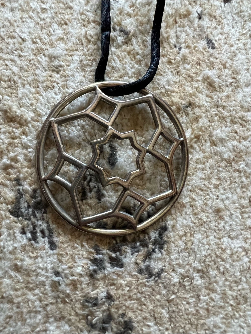 Tiffany & Co Paloma Picasso Zellige pendent in silver on silk cord